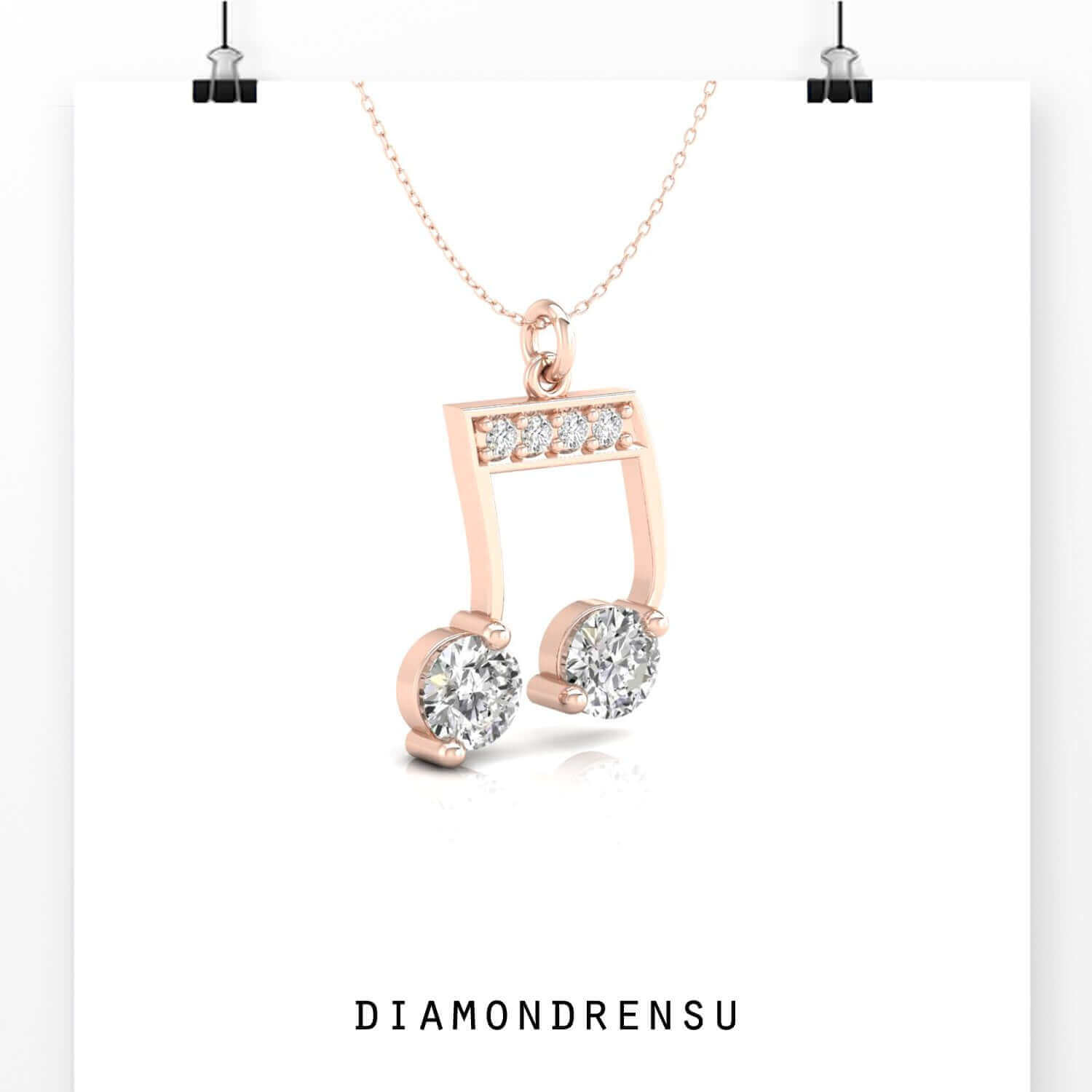 Prong setting pendant with lab grown diamond and music symbol.