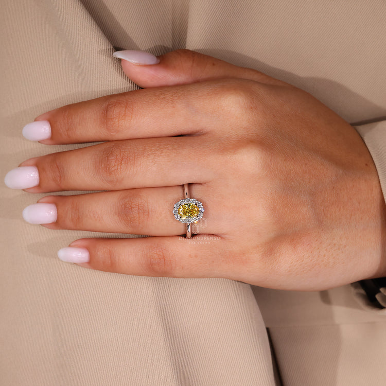 Cathedral setting ring with halo design.