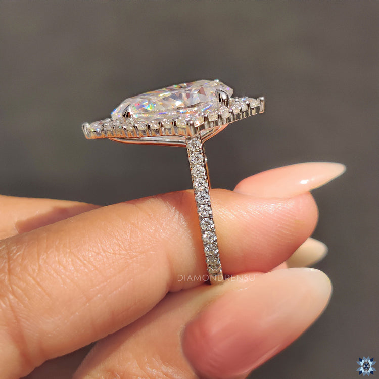 Custom engagement ring with pear shape engagement ring