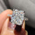 Radiant Cut Engagement Ring featuring a hidden halo moissanite ring design. Radiant Cut Engagement Ring featuring a hidden halo moissanite ring design.