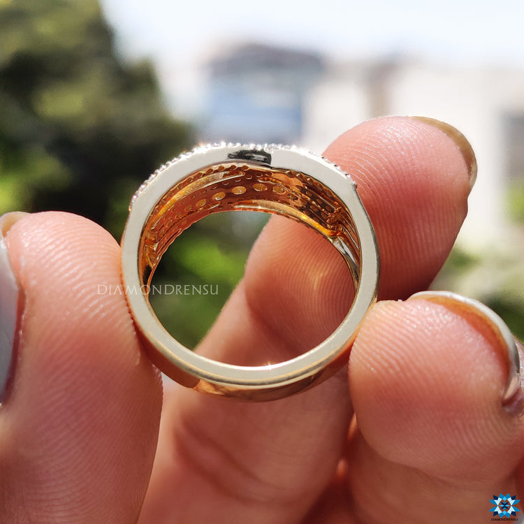 UK engagement ring with criss cross pave band and moissanite.