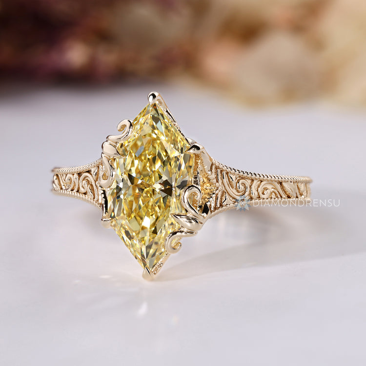 Dutch marquise diamond ring with claw prong setting.