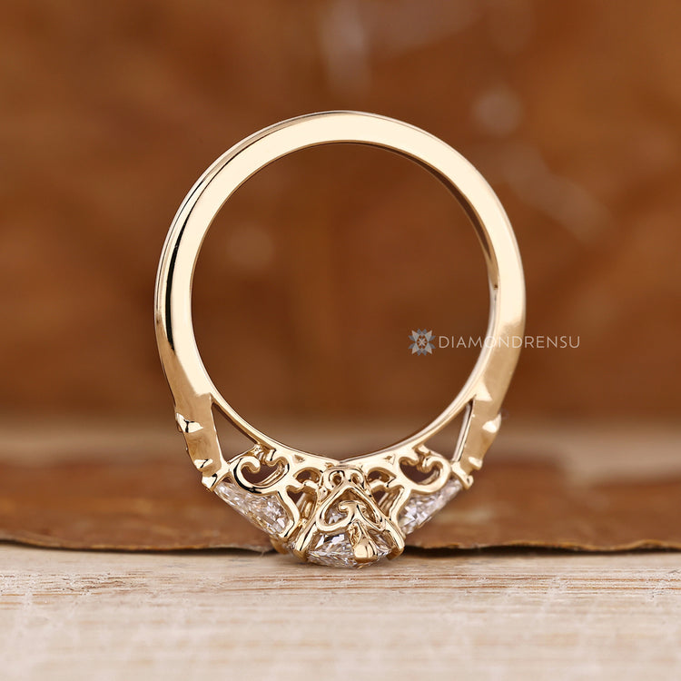 Three stone ring with marquise and kite diamonds.