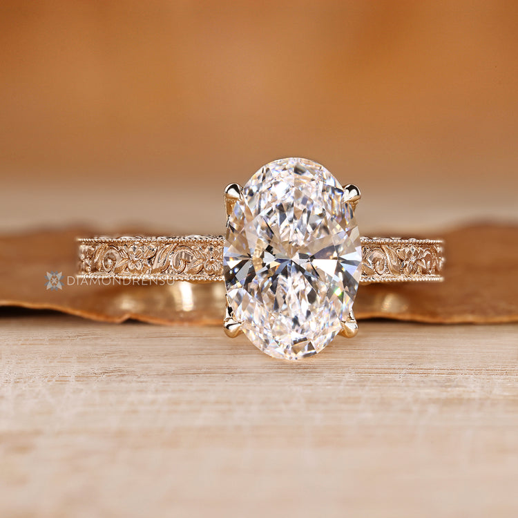 Lab grown diamond ring with four claw prong setting.