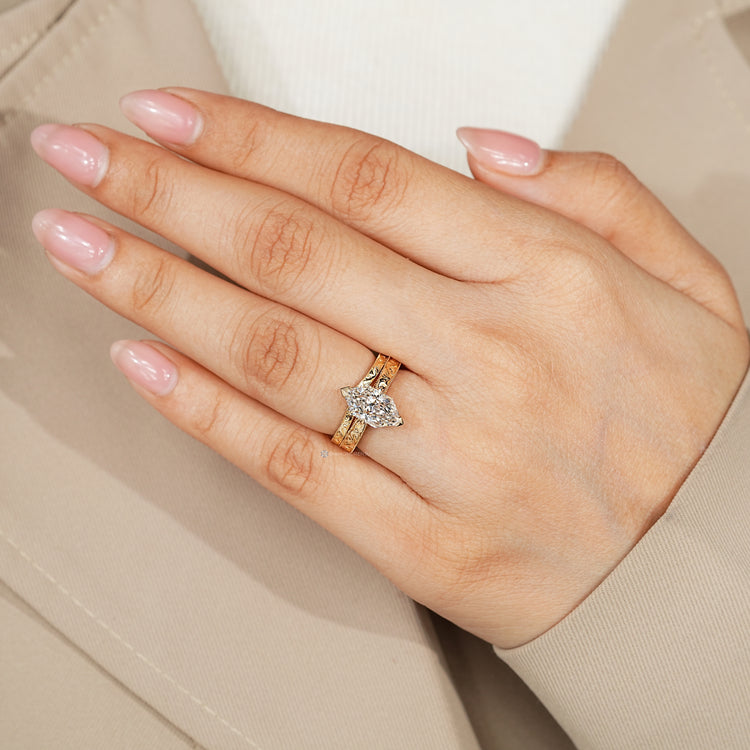 Dutch marquise bridal set with milgrain detailing.