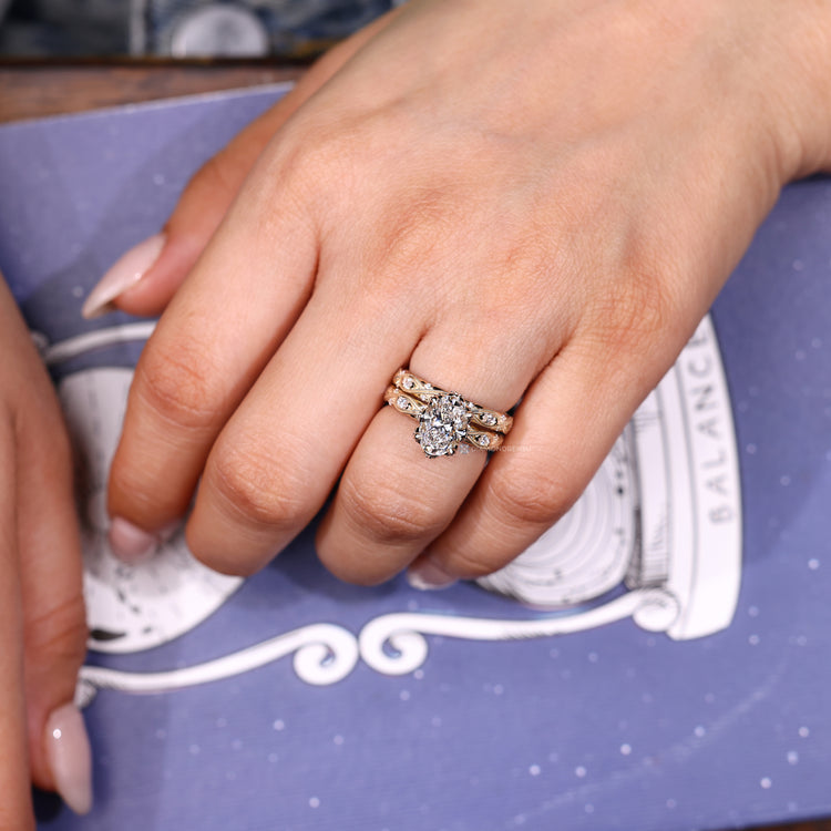 Vintage style diamond ring with milgrain details.