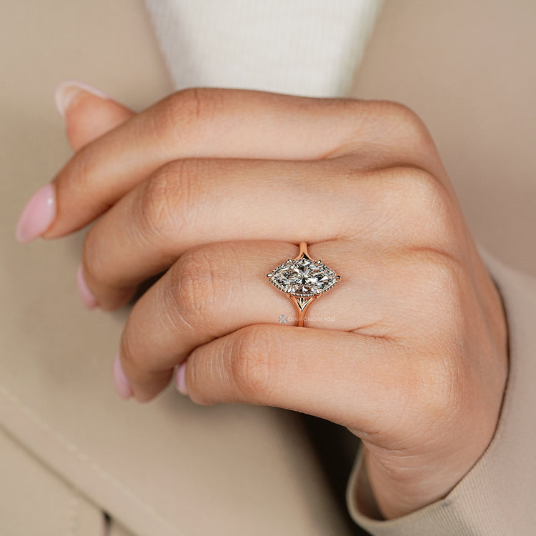 IGI certified marquise cut diamond solitaire ring.