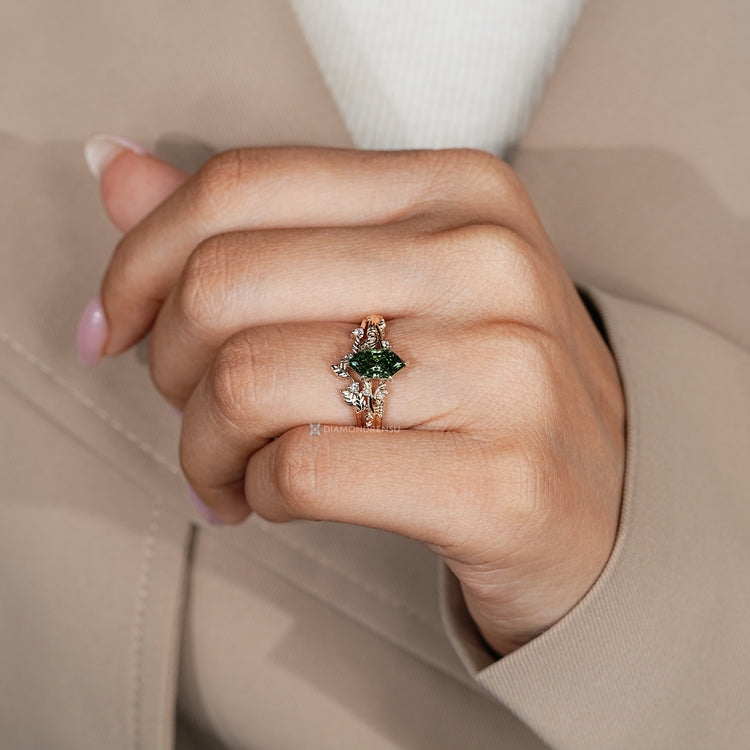 Green Dutch marquise diamond ring with nature inspired style.