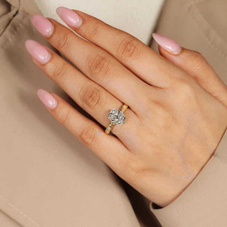 IGI certified cushion cut diamond ring with milgrain details.