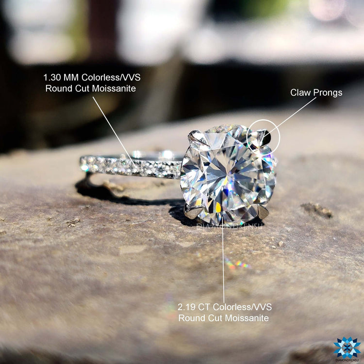 Handmade jewelry with white gold and round moissanite.