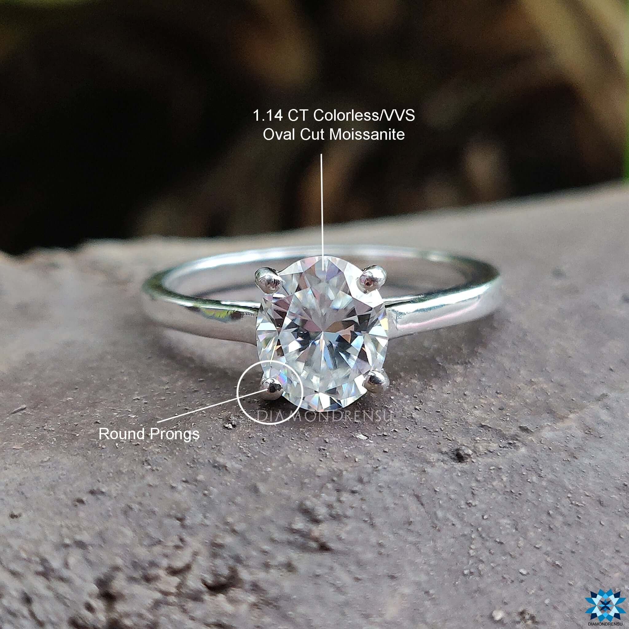 Handmade ring in white gold featuring a 4 round prong set for moissanite.
