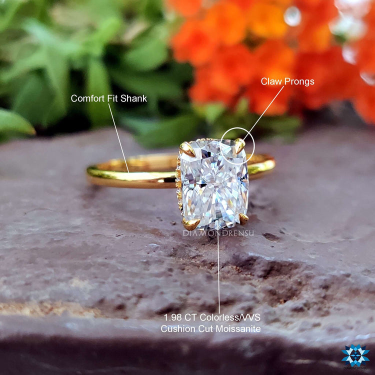 Handmade jewelry with elongated cushion cut moissanite center.
