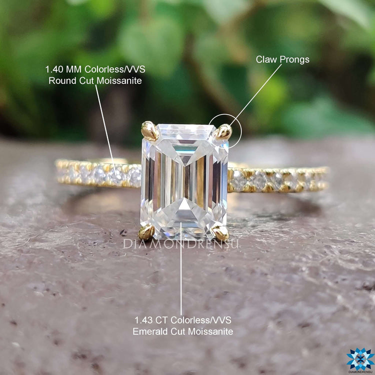 Handmade jewelry with emerald cut moissanite and hidden halo.