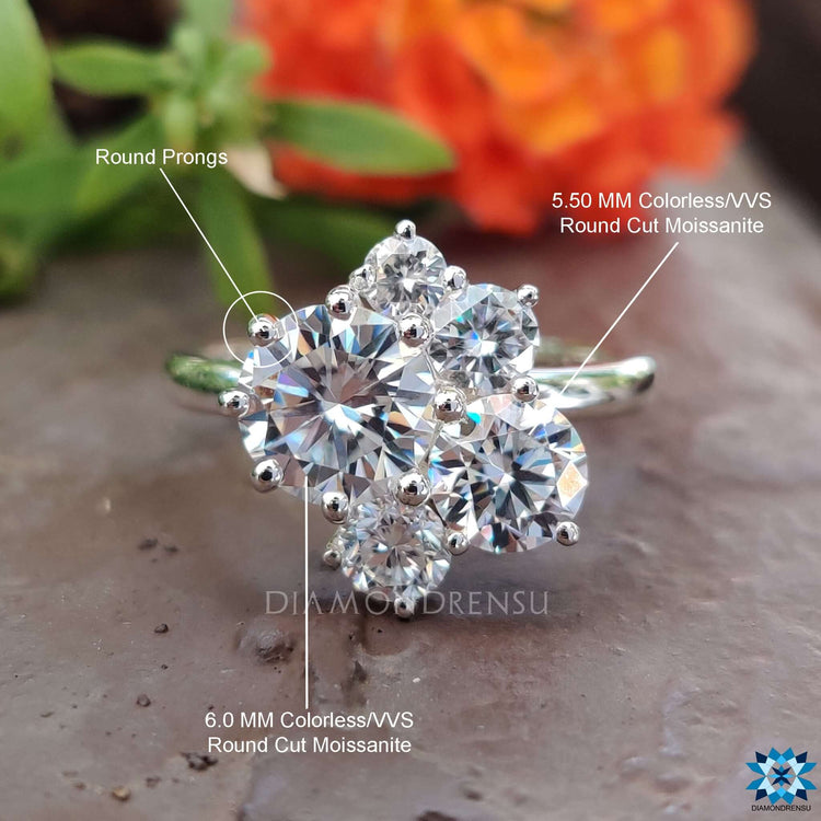 Handmade ring with vintage five stone round cut moissanite.