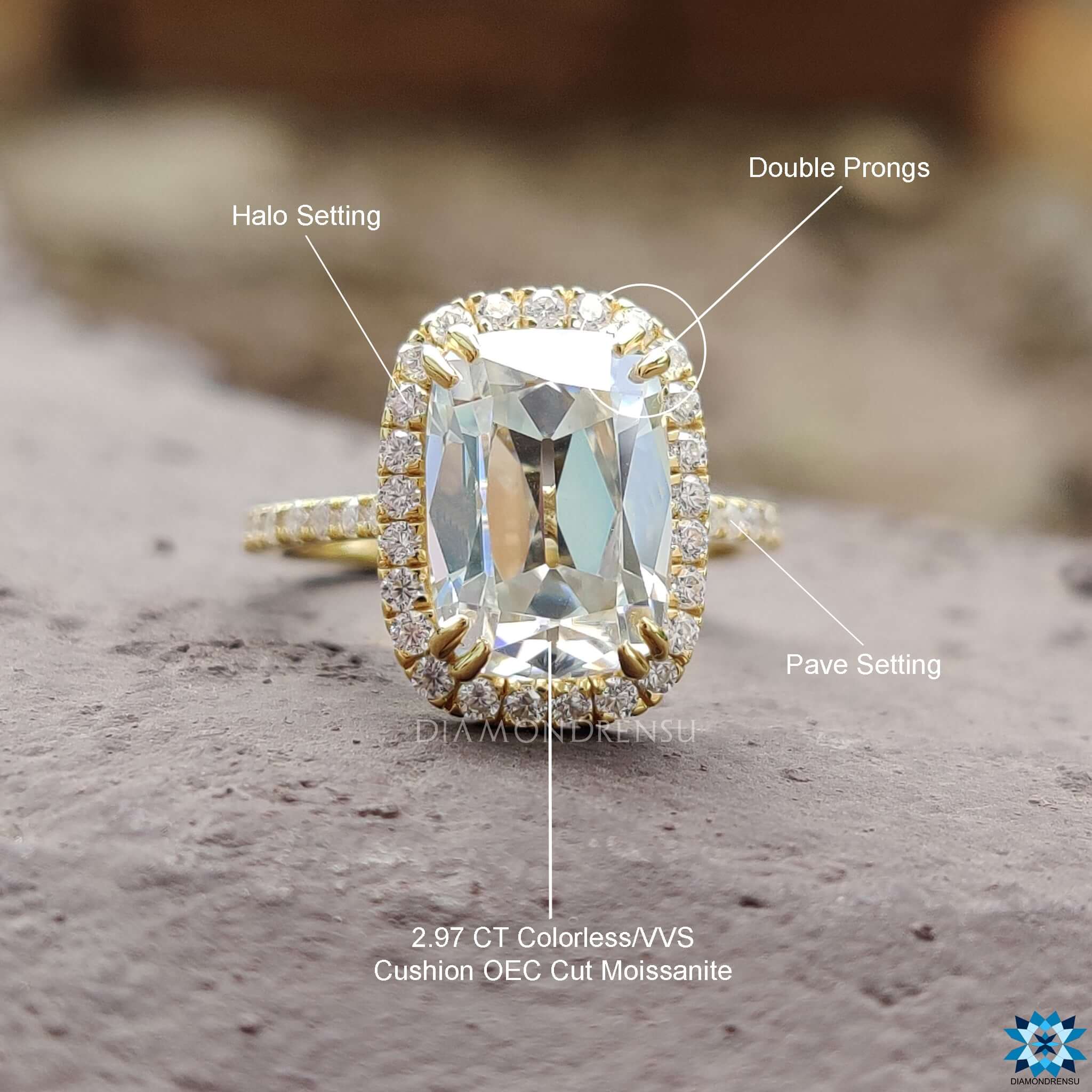 Double claw prong setting with cushion moissanite center stone.