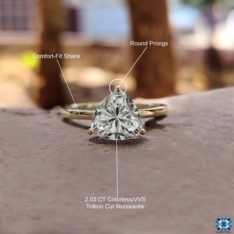 Handmade jewelry ring with trillion cut moissanite.