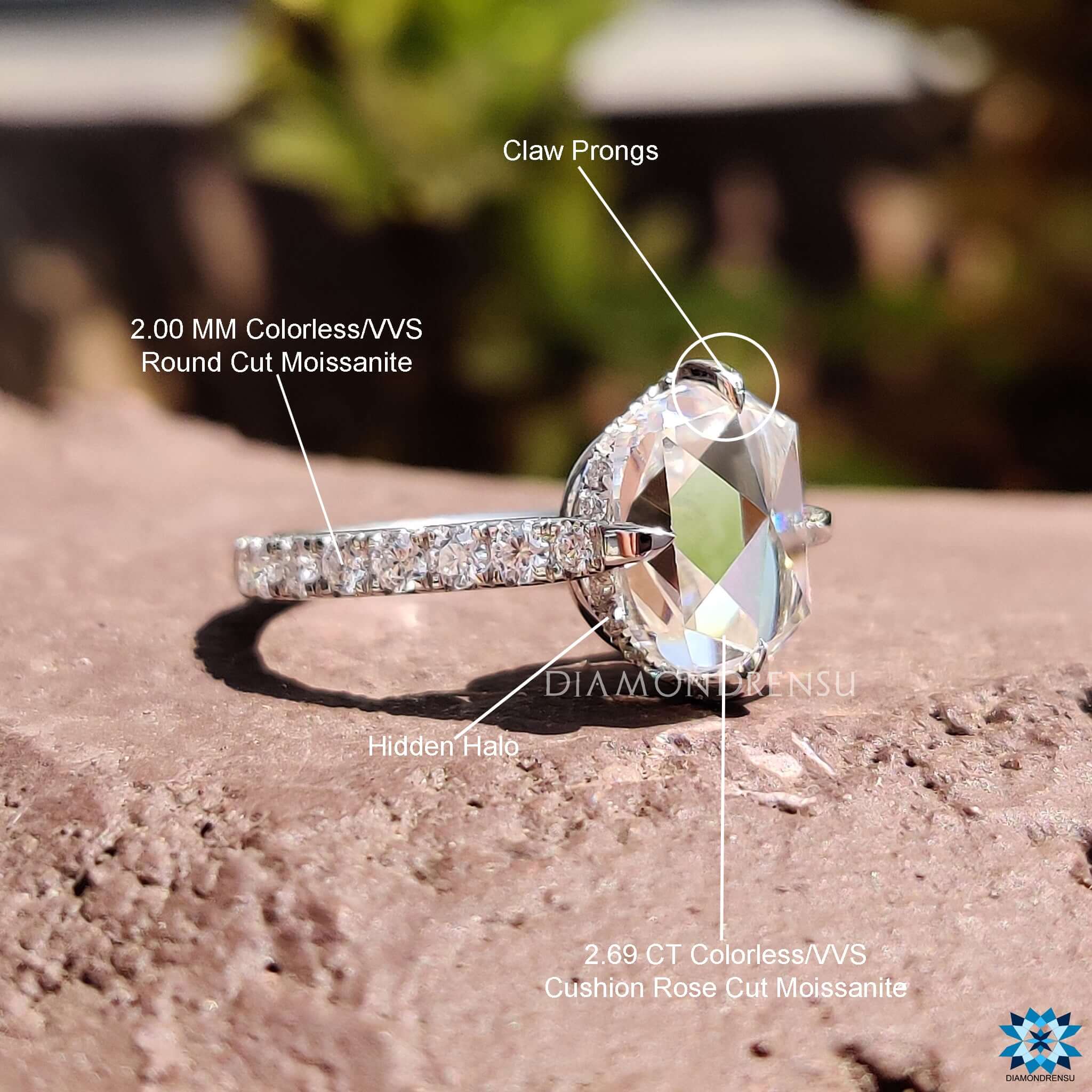 Custom white gold engagement ring with rose cut moissanite.