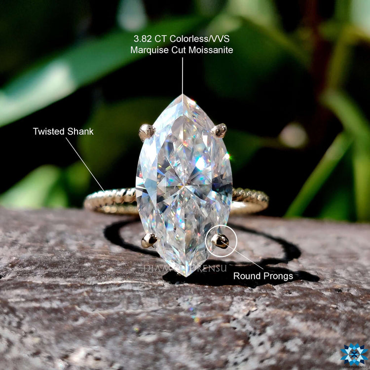 Diamondrensu UK marquise cut engagement ring.