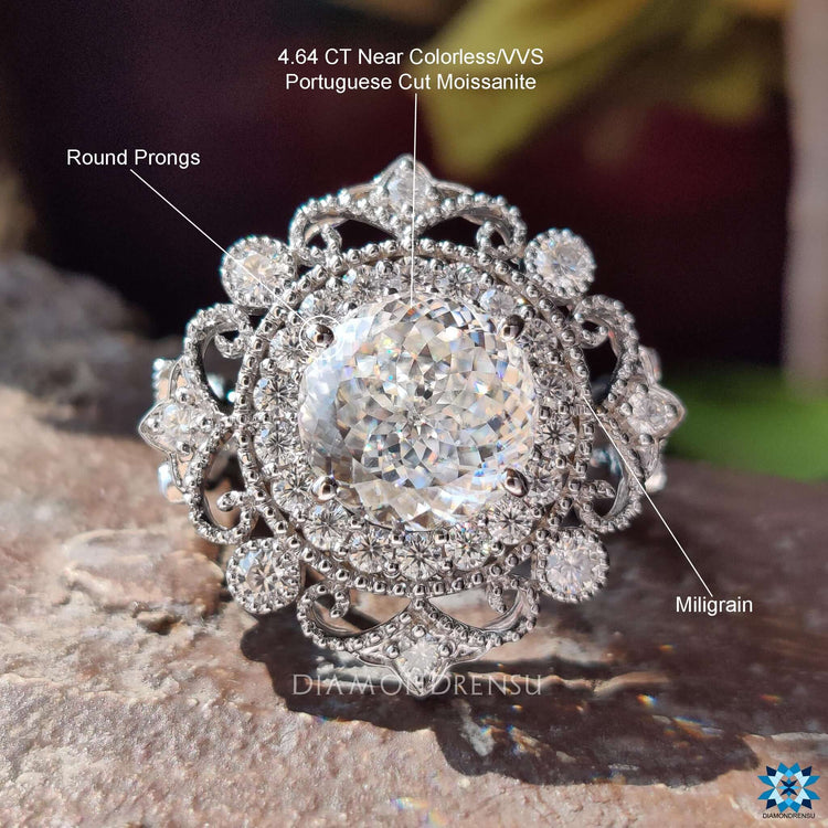 Handmade moissanite ring featuring intricate vintage work.