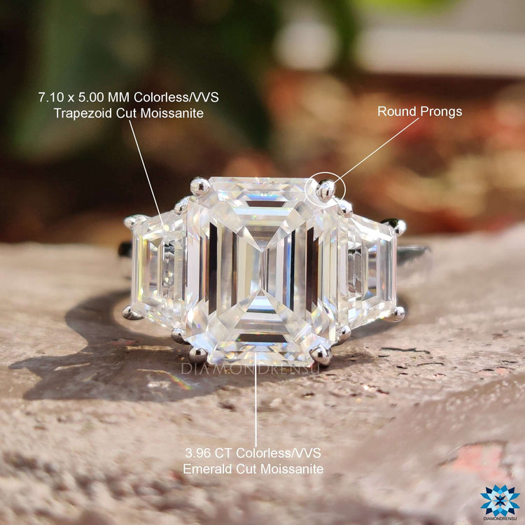 Moissanite engagement ring designed with emerald and trapezoid stones.