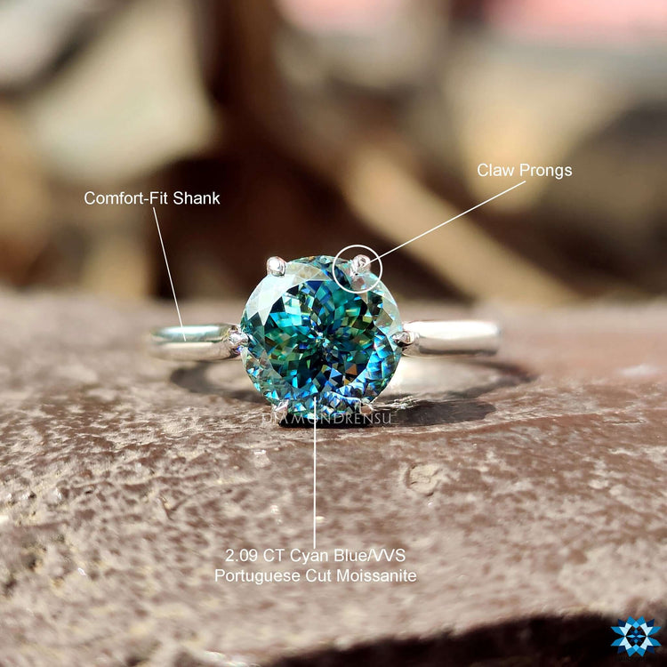 Handmade moissanite engagement ring with tulip design.