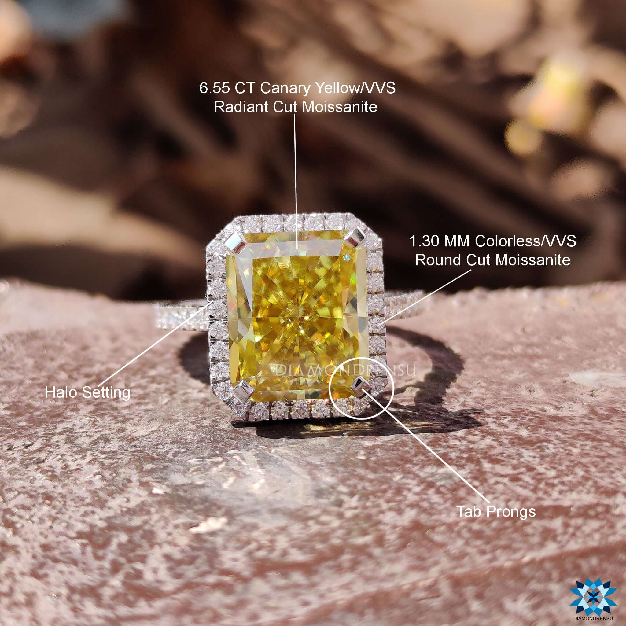 Pave setting ring with canary yellow radiant moissanite.