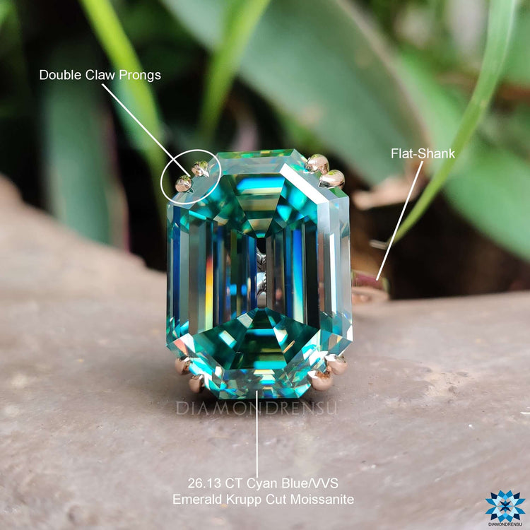 Cathedral setting ring with emerald Krupp cut moissanite.