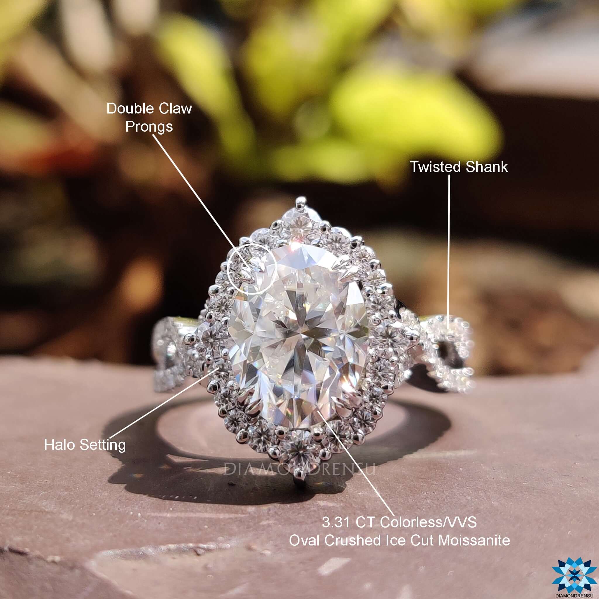 Round cut halo setting on white gold ring.