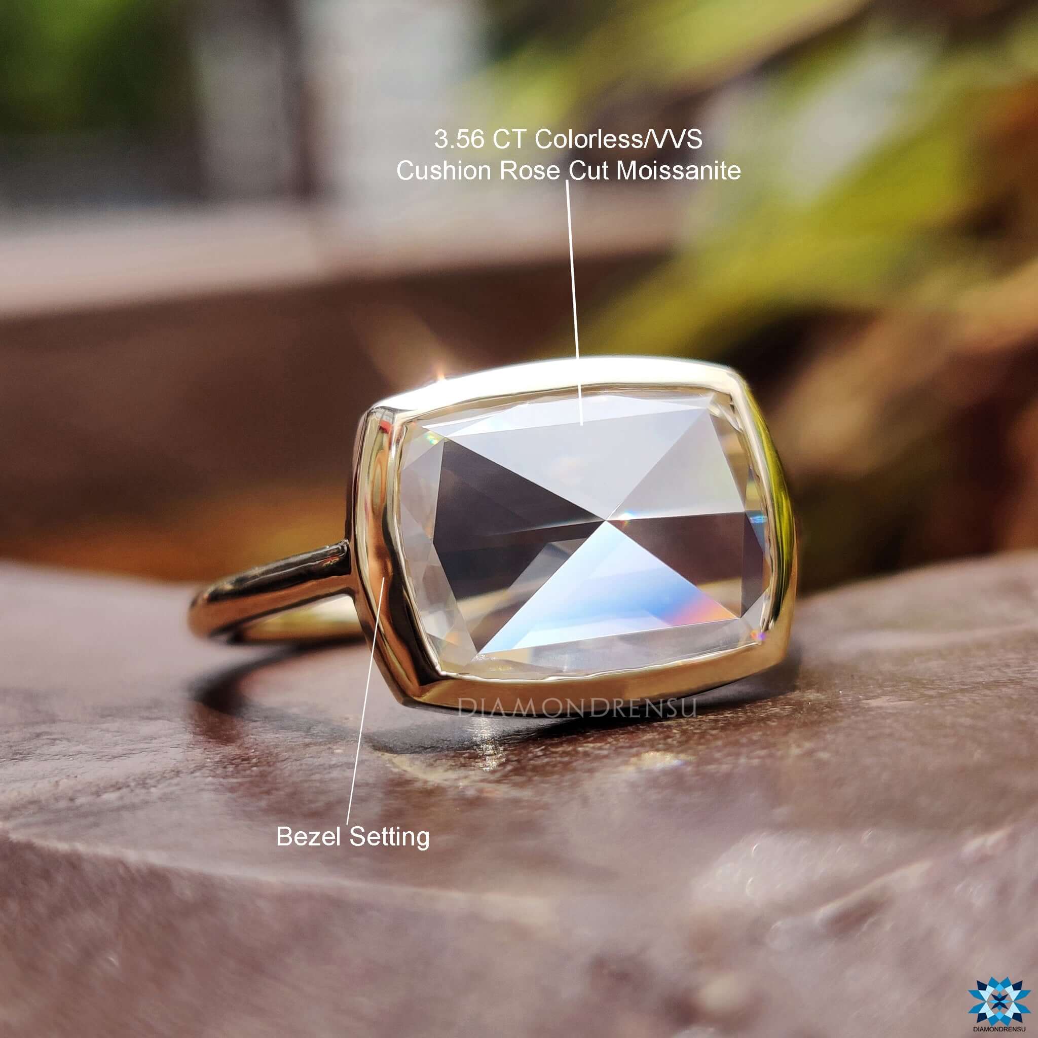 Handmade jewelry featuring bezel set cushion moissanite.