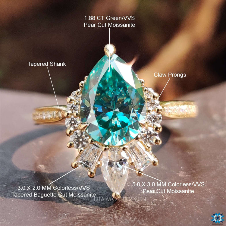 Tapered pave set pear shape ring in a vintage style.