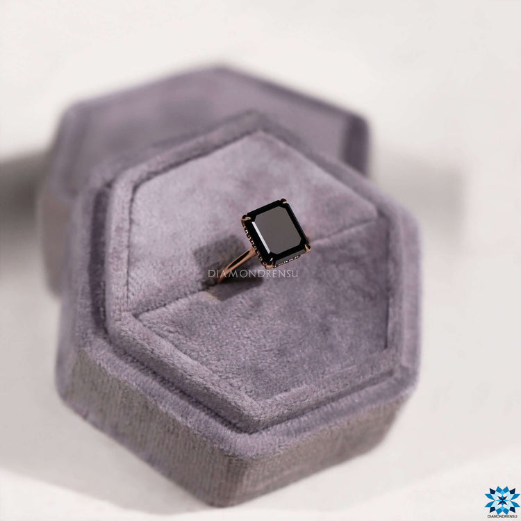 Hidden halo black moissanite engagement ring.