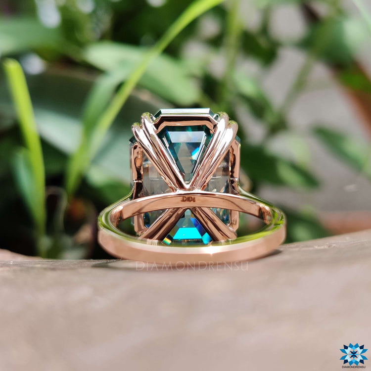 Custom engagement ring with emerald Krupp cut moissanite.