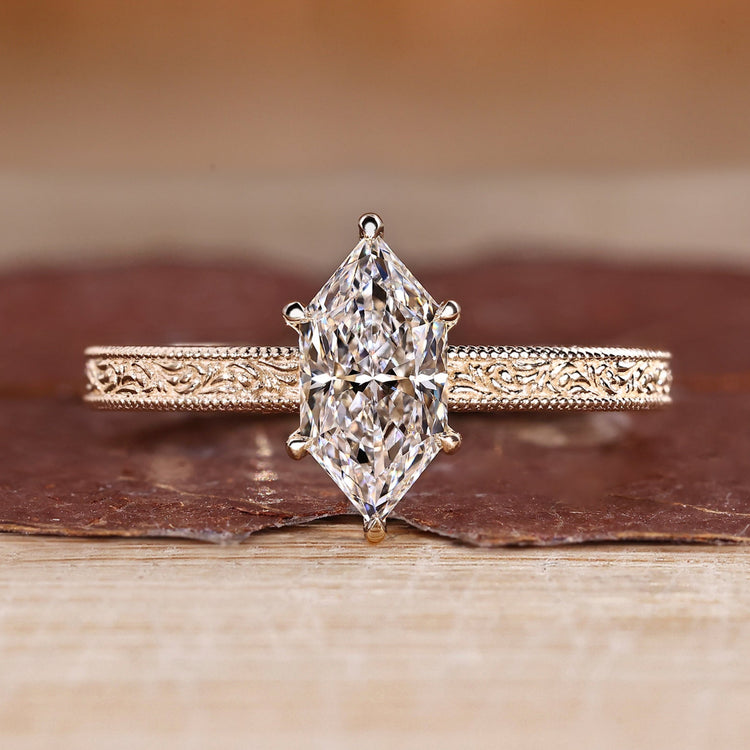 Dutch marquise lab grown diamond ring with milgrain details.