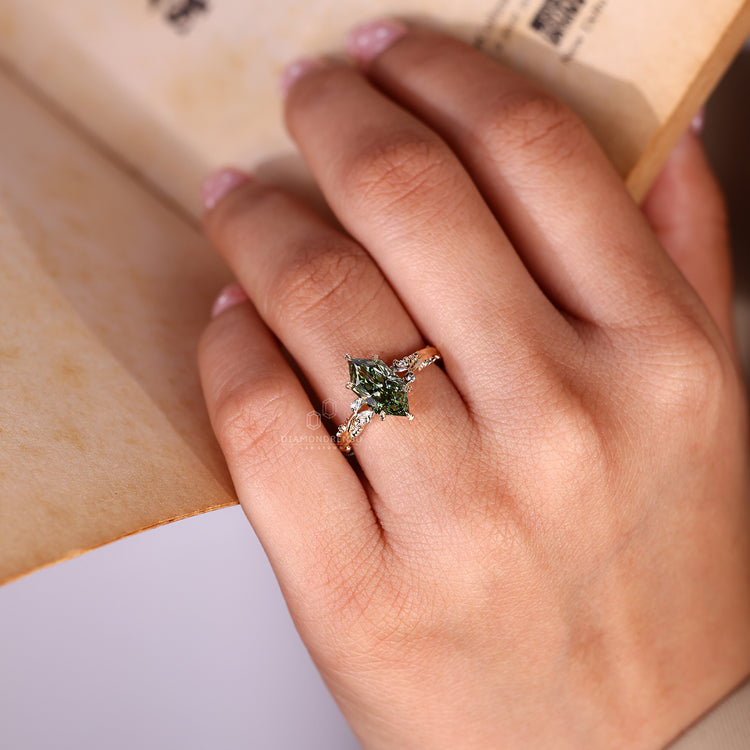 Lab grown green diamond ring with nature inspired design.