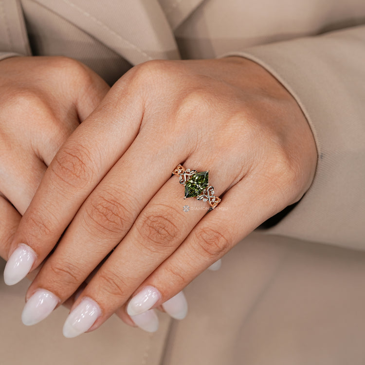 Handmade green centre diamond ring with prong setting.