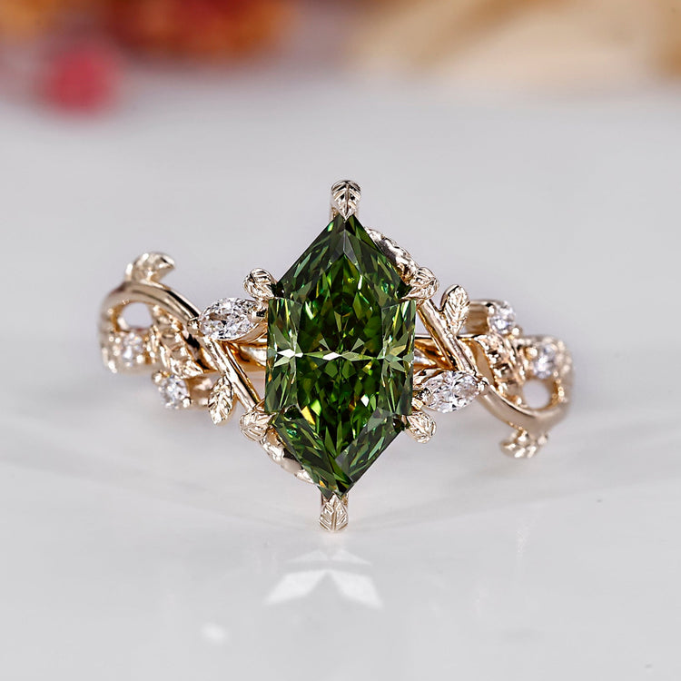 Dutch marquise engagement ring with green diamond and leaf details.