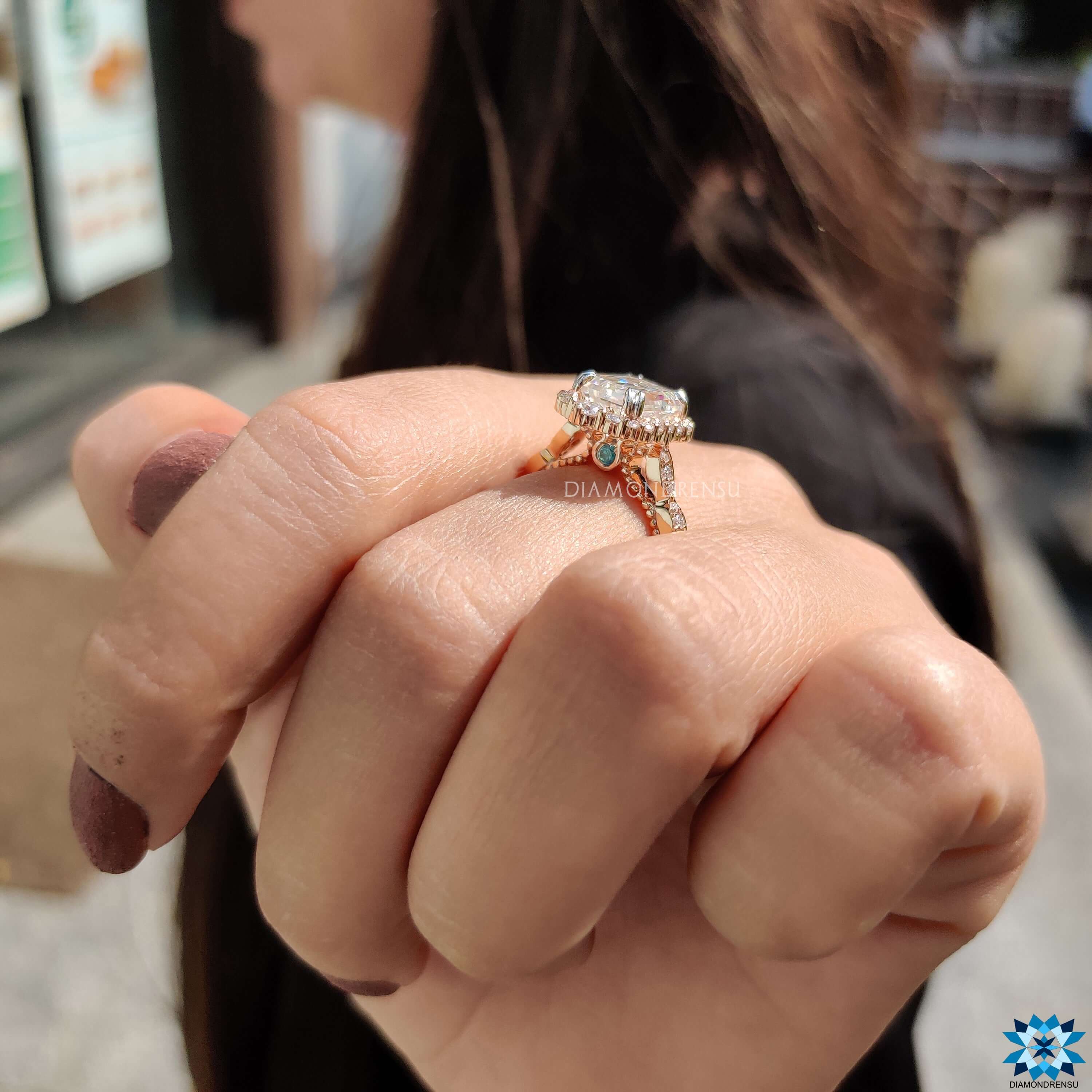 Buy moissanite ring featuring blue moissanite stone.