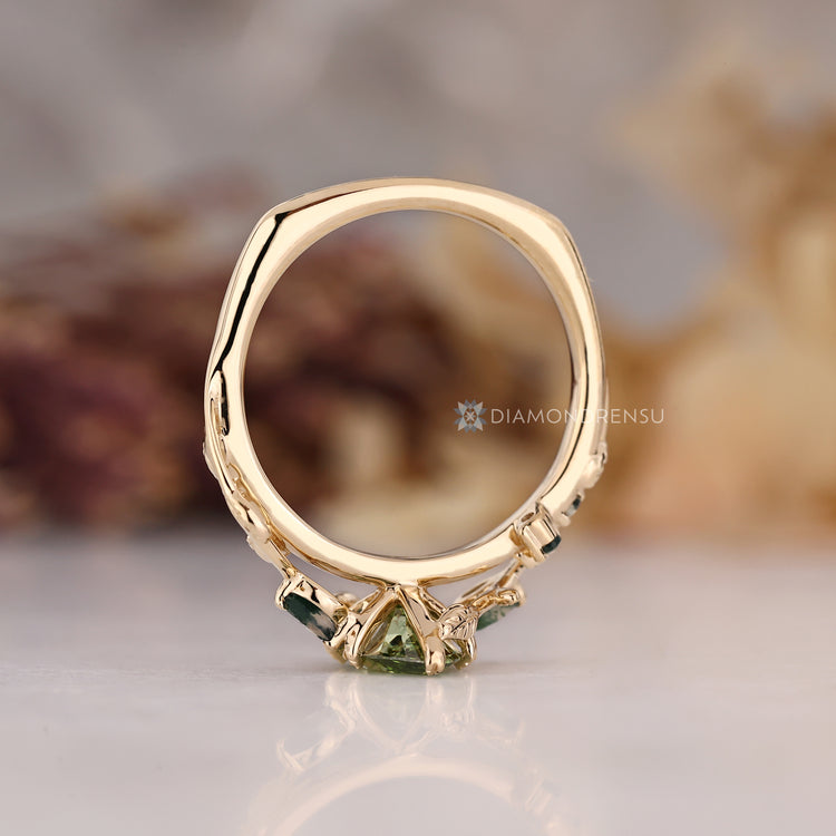 Marquise diamond ring with six leaf style prong setting.