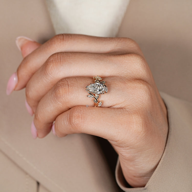 IGI certified pear cut diamond engagement ring.