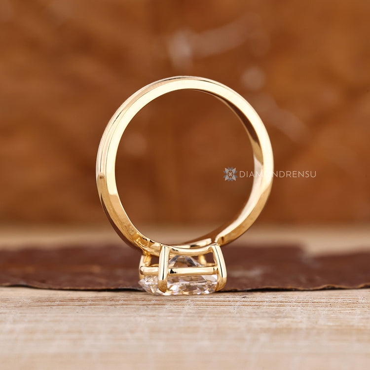 Handmade oval ring with east to west setting.