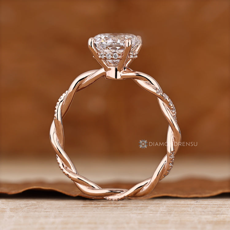 Handmade engagement ring with twisted shank design.