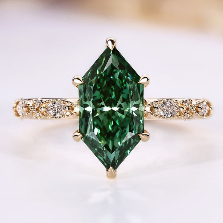 Vintage engagement ring with green Dutch marquise diamond.