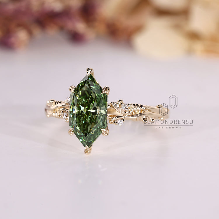 Dutch marquise ring with art deco and round diamonds.