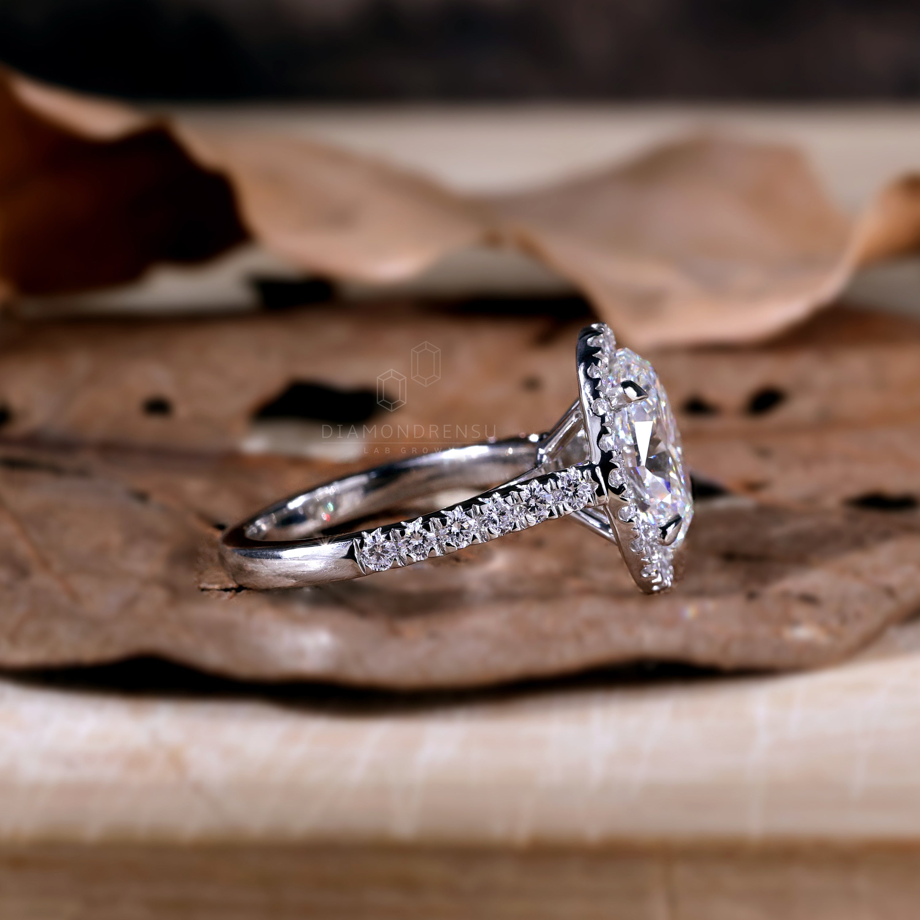 Gorgeous halo ring oval design with lab grown diamond sparkle.