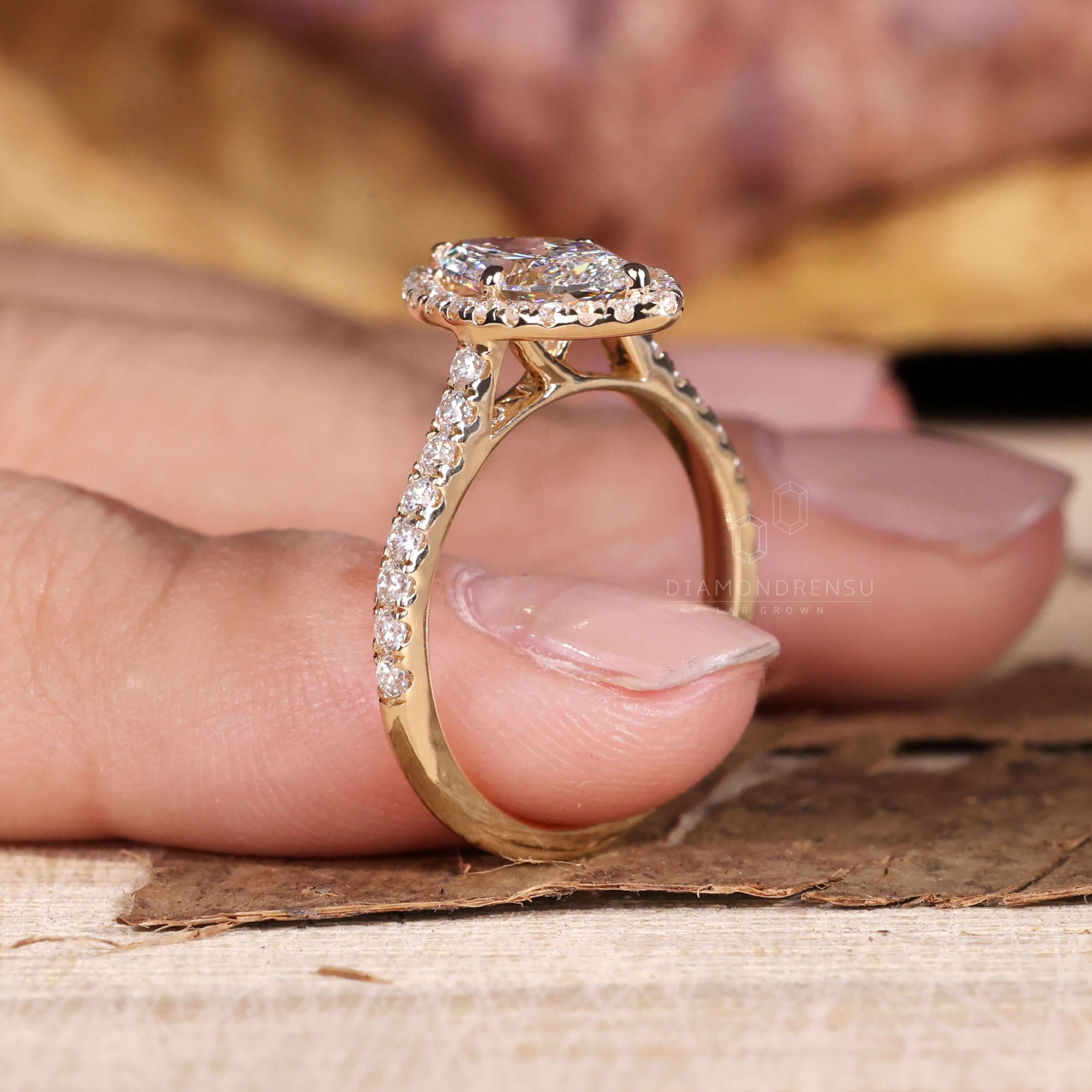 Marquise diamond ring with pave band engagement ring details