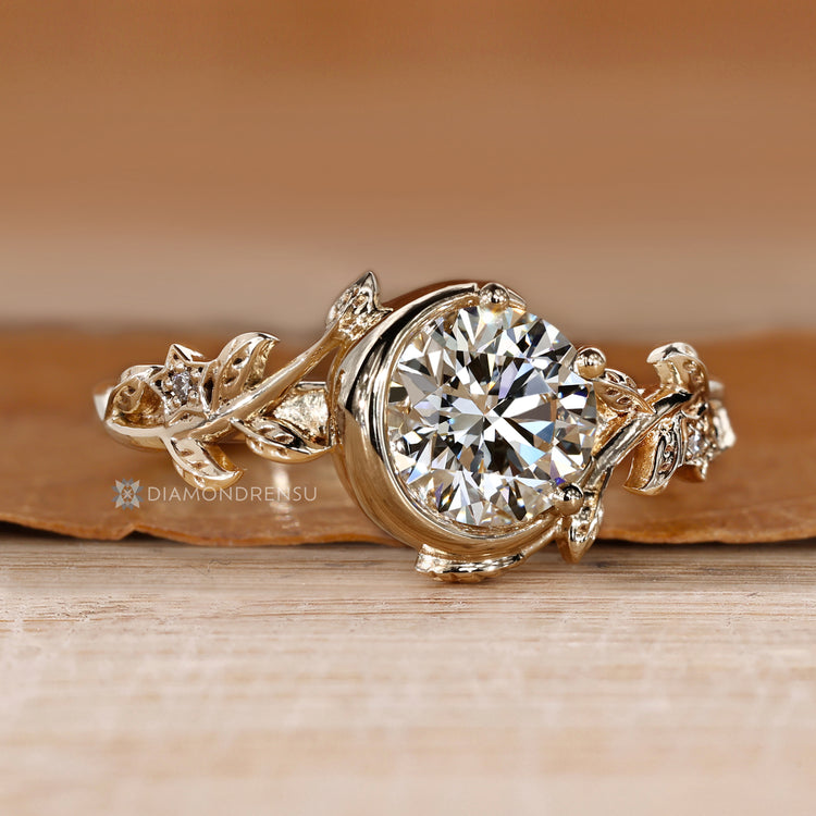 Lab grown round cut diamond ring with side stones.