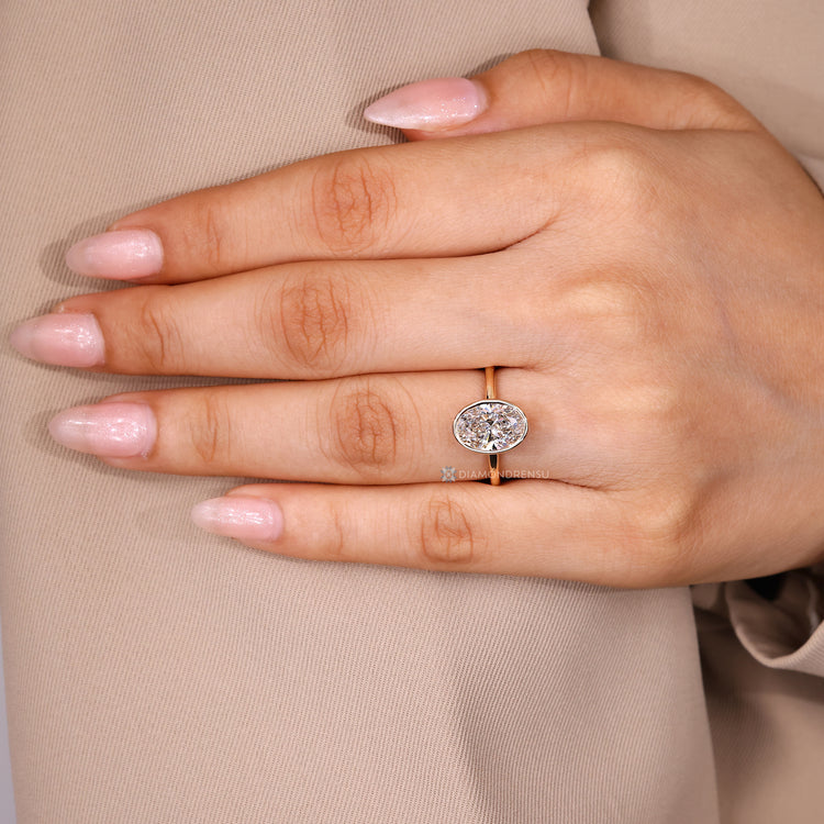 IGI certified lab grown oval diamond ring.