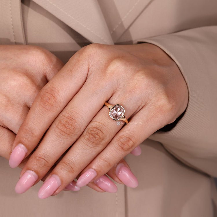 Tapered shank ring with cushion rose cut diamond.