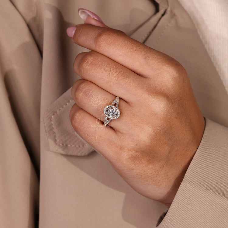 Handmade oval diamond ring with pave and split shank.