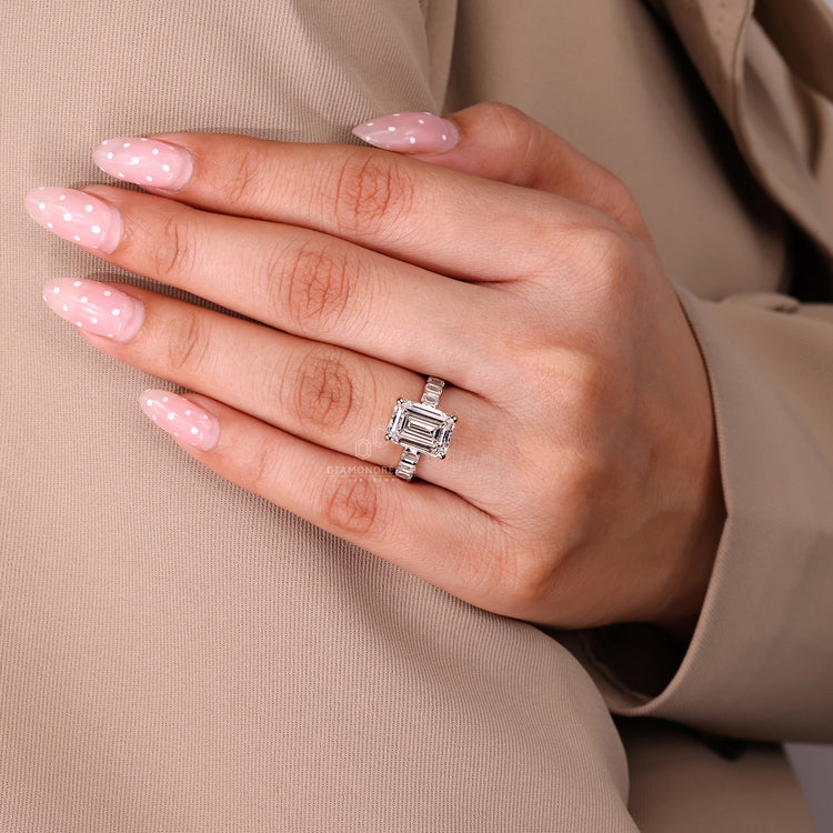 Lab grown emerald cut ring with pavé detailing.